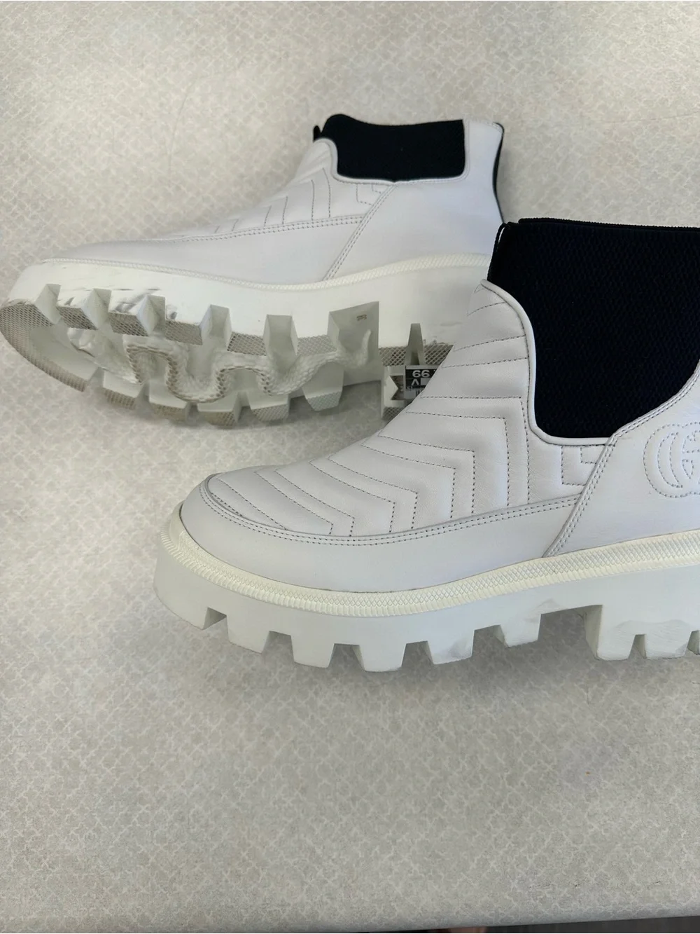 Gucci Women’s White and Black Slip-On Quilted Boots